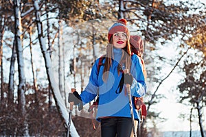 Woman Traveler with backpack hiking Travel Lifestyle adventure concept active vacations outdoor. Beautiful landscape