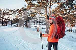 Woman Traveler with backpack hiking Travel Lifestyle adventure concept active vacations outdoor. Beautiful landscape forest