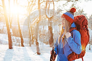 Woman Traveler with backpack hiking Travel Lifestyle adventure concept active vacations outdoor. Beautiful landscape forest