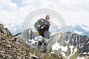 Woman traveler with backpack hiking Travel Lifestyle concept