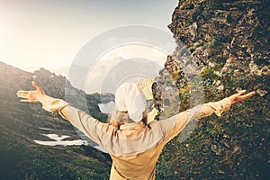 Woman Traveler hands raised hiking Travel Lifestyle concept Summer adventure