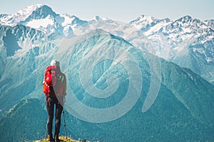Woman Traveler hiking enjoying mountains landscape