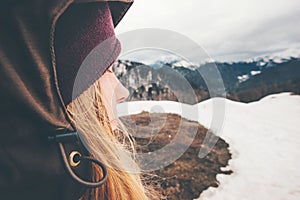 Woman Traveler hiking in mountains