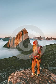Woman traveler hiking outdoor in Norway
