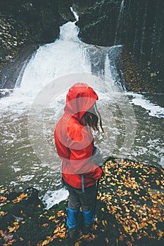 Woman Traveler hiking at waterfall