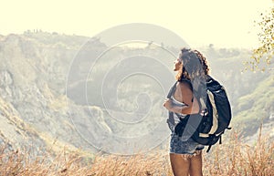 Woman traveler looking at mountain