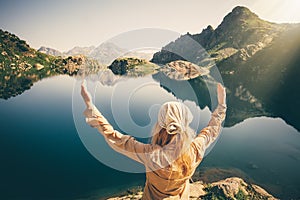 Woman Traveler meditating harmony with nature