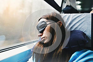 Woman traveler sleeps sweetly train Travel lifestyle