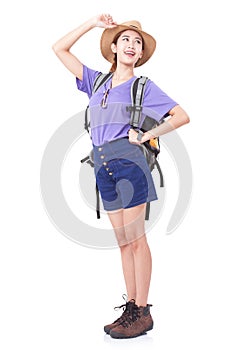 Woman traveler standing on the floor with backpack