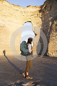 Woman traveling with backpack solo