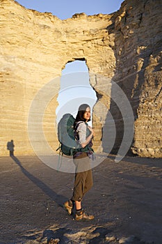 Woman traveling with backpack solo