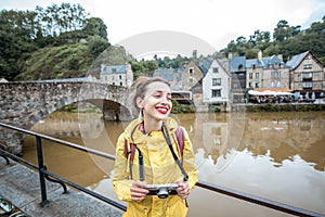 Woman traveling in french town Dinan