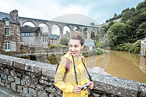 Woman traveling in french town Dinan