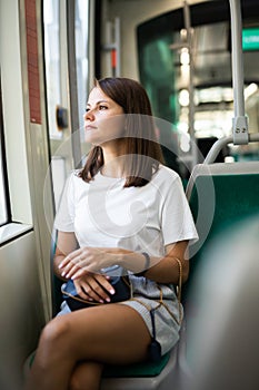 Woman traveling in public transport