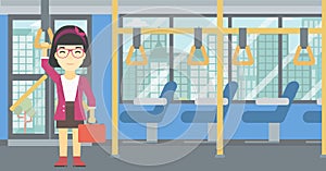 Woman traveling by public transport.