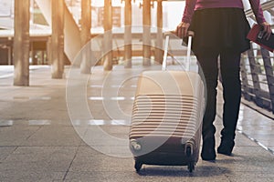 Woman traveller in airport walkway. Travel concept.