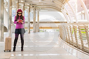 Woman traveller in airport walkway. Travel concept.