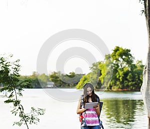 Woman traveller using digital devices