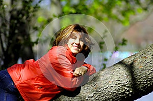 Woman on Tree Limb