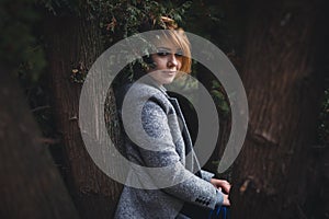 Woman among trees photo