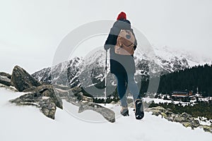 Woman trekking in High Tatra mountains in winter, Slovakia