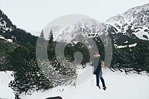 Woman trekking in High Tatra mountains in winter, Slovakia