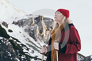 Woman trekking in High Tatra mountains in winter, Slovakia