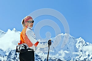 Woman trekking in Himalayas,