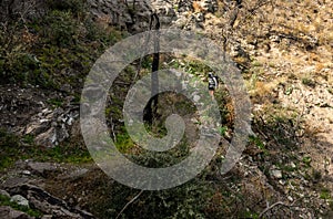 Woman Treks Down Juniper Canyon Trail