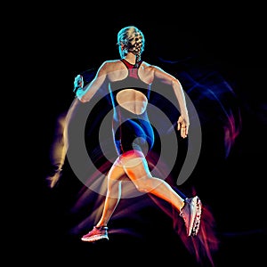 Woman triathlon triathlete runner running joogger jogging isolated black background