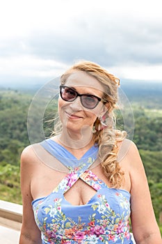 Woman on the tropical balinese landscape background, North of Bali island, Indonesia.