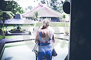 Woman on the tropical balinese landscape background, North of Bali island, Indonesia.