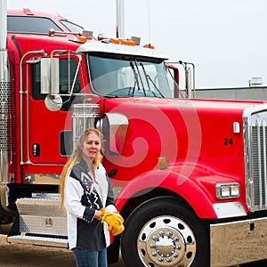 Woman Truck Driver Putting on her gloves