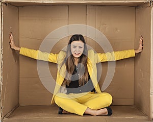 Woman trying to enlarge the office space