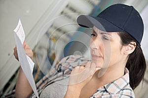 woman trying to fathom instructions