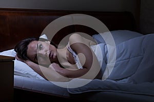 Woman trying to sleep photo
