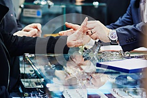 Woman trying wedding rings