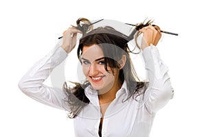 Woman twirl her hair with sticks