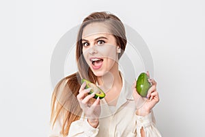 Woman with two avocado.