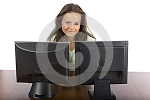 Woman at the two lcd screens