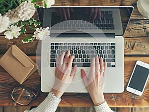 Woman types on laptop keyboard, woman types on laptop with her hands