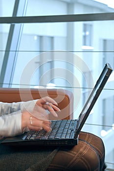 Woman typing on the computer.