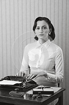 Woman typing in her office