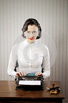 Woman typing in her office