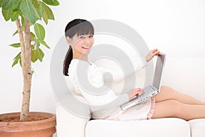 Woman typing laptop