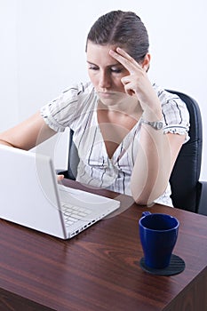 Woman typing on laptop