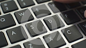 Woman typing on laptop, secretary working on documents, home or office usage