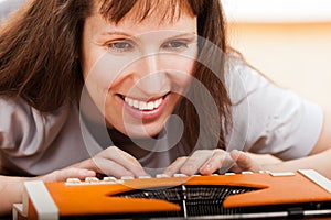 Woman typing typewriter
