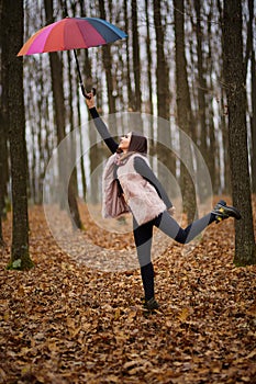 Woman with umbrella dragged by the wind