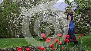 Woman umbrella garden